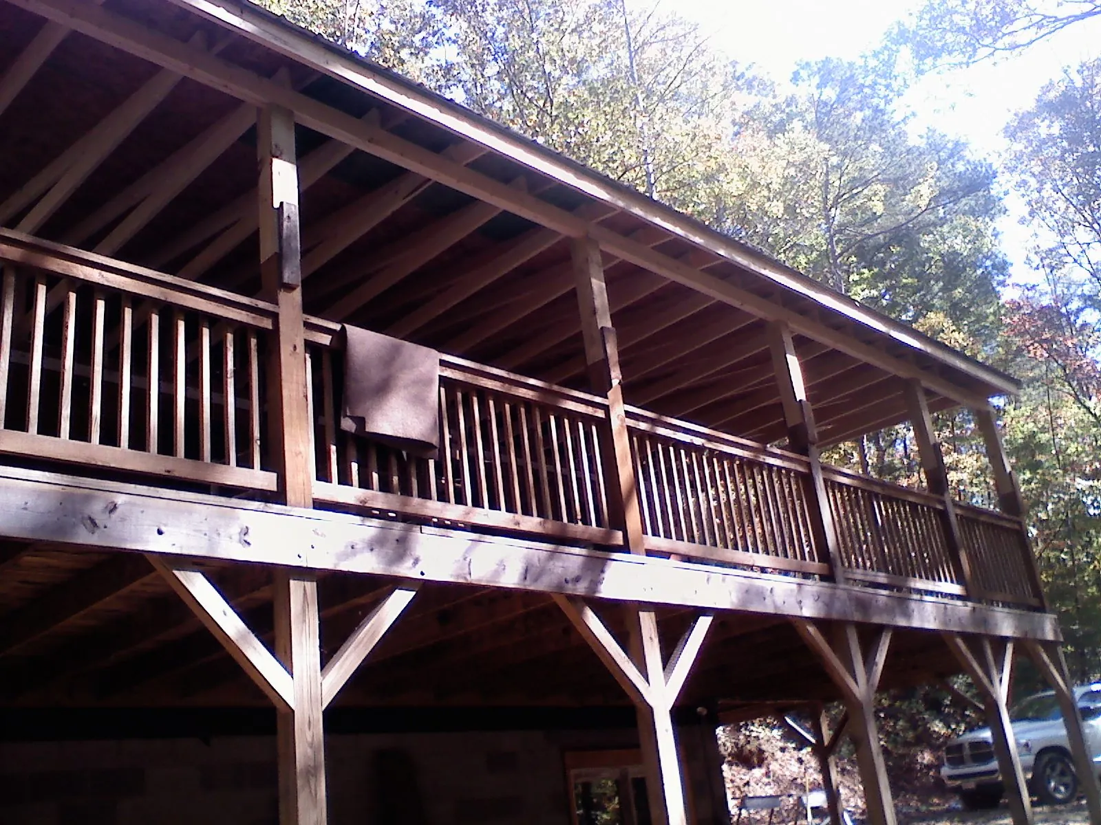 Timber framing under a new elevated porch and deck — Roof Leak Repair in La Center by Roofing Brothers
